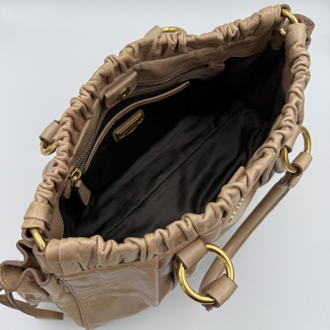 🔥 PreOwned Miu Miu Vitello Beige Leather Handbag 🔥