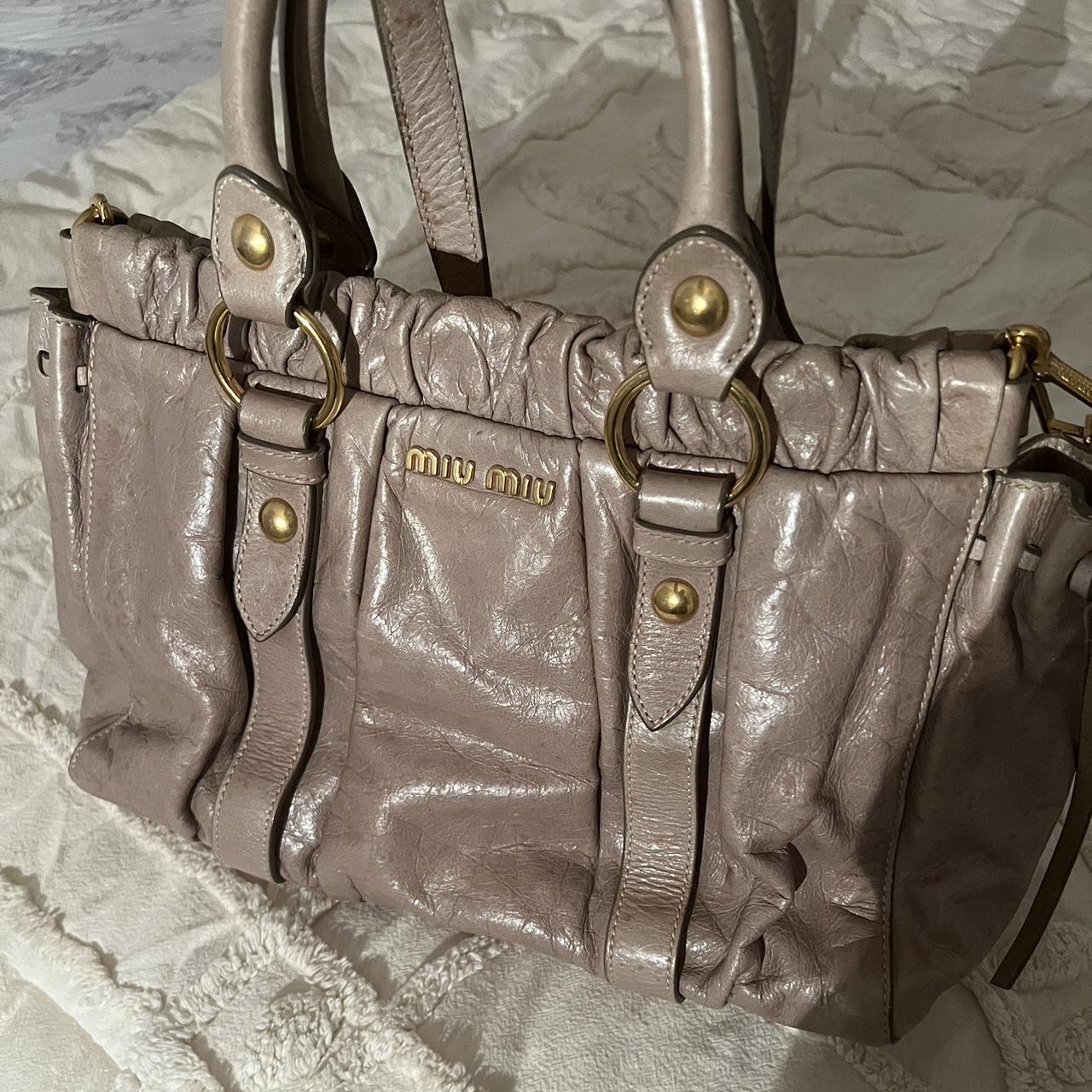Authentic Grey Miu Miu Vitello Leather Bag With Gold Hardware And Removable Strap